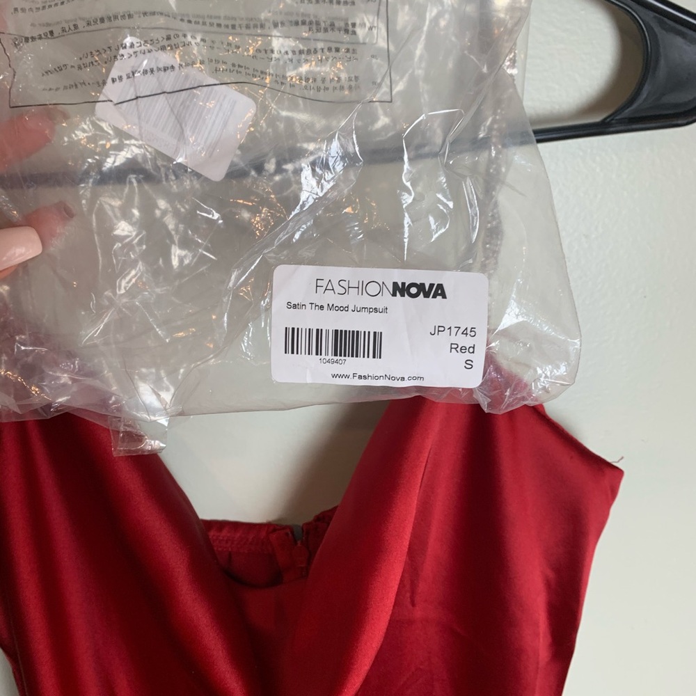 Red satin jumpsuit from Fashion Nova